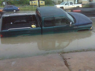 Illustration for article titled Turn Around Don't Drown: Houston Street Flooding Mega-Gallery